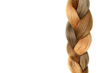 Pigtail of different color hair on white background