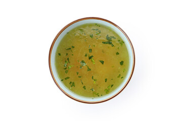 Plate with broth isolated on white background