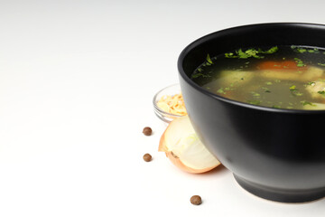 Concept of tasty food with chicken soup on white background