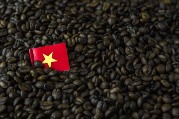 Robusta coffee with a mini flag of the country Vietnam. The concept of patriotism and pride