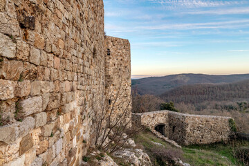 The ancient Rocca di Pietracassia, Lajatico, Italy, in the sunset light