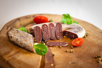 Fresh meat and vegetables on wooden boards