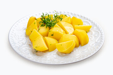 Boiled slices of potatoes with herbs.