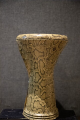 Middle eastern drum in a grey music recording studio