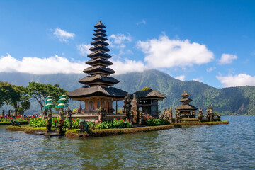 Obraz premium Bali water temple on Bratan Lake is the most beautiful temple in Bali, Indonesia. Pura Ulun Danu Beratan Temple, or Pura Bratan is located by the lake and surrounded by forested mountains.