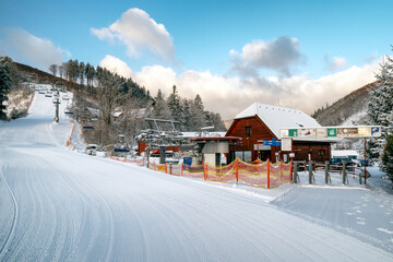 Bottom station of ski-lift chair at resort Snowland Valca in winter season.