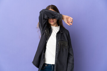 Fototapeta premium Young Lithuanian woman isolated on purple background covering eyes by hands