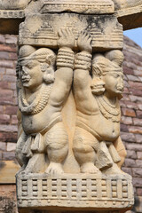 Fototapeta na wymiar Stupa No 3, Dwarfs uphold the Pillars. World Heritage Site, Sanchi, Madhya Pradesh, India.