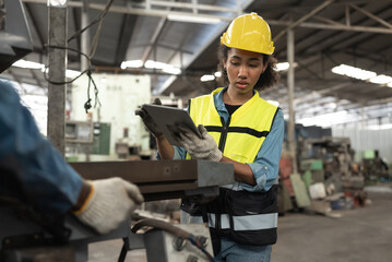 Engineer woman and mechanic hard work with machine at factory
