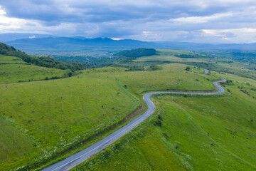 Fototapeta na wymiar Above view of countryside road, aerial view