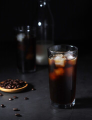 Cold coffee with ice in low key	