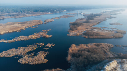 Aerial view of the Boryspil Islands near flooded village of Gusintsy, Rzhishchev, Ukraine. Winter time