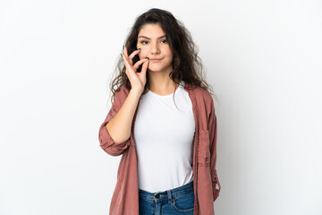 Teenager Russian girl isolated on white background showing a sign of silence gesture