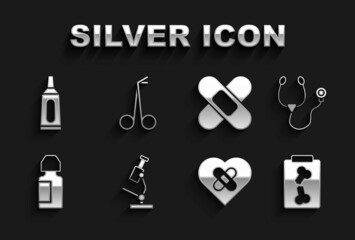 Set Microscope, Stethoscope, X-ray shots, Healed broken heart, Eye drop bottle, Crossed bandage plaster, Ointment cream tube medicine and Medical scissors icon. Vector