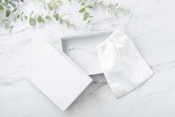 White box open with fabric bag mockup