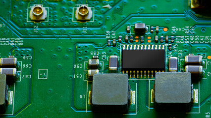 Fototapeta premium Close up of components and microchips on PC circuit board.