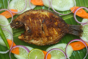 Karimeen fry fish fry with vegetables 