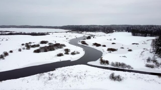 flight over the river not frozen in winter, hilly landscape, pushkin mountains, mikhailovskoye