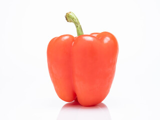 A red bell pepper or paprika in white, Vegetable or food background, Nobody