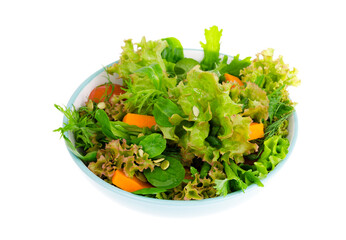 Healthy pumpkin salad with tomato, lettuce and seeds.