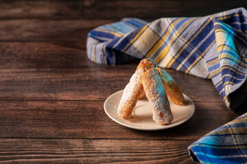 Homemade cookies with fruit jam and cottage cheese on a light wooden background. A close photo. Dessert for breakfast.