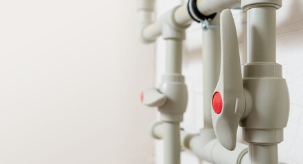 Plumbing installation of water pipes with valves.