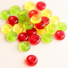 Hard candy. Colorful fruit candies on white background.