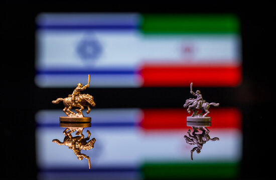 Conceptual image of war between Israel and Iran using toy soldiers and national flags