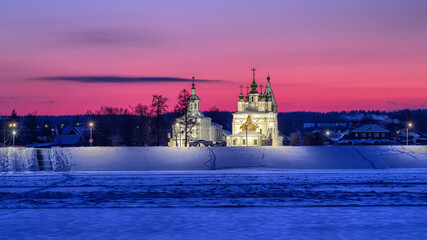 Fototapeta premium Ancient orthodox church in Veliky Ustyug at sunset.