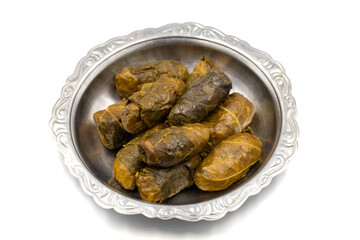 Meat leaf wrapping. Traditional Mediterranean flavor. Wrapped leaves with yogurt on a white background. local name etli yaprak sarma