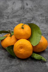 Tangerine on dark background. close up