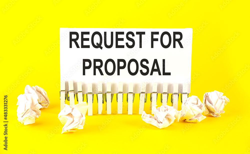 Poster white paper on the yellow background with text request for proposal