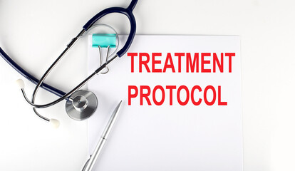 TREATMENT PROTOCOL text written on the paper with a stethoscope. Medical concept.