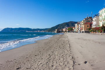 the beach of alassio, in the riviera di ponente coast, in liguria, on a clear November morning