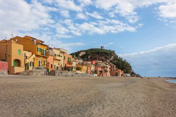 a view of the colorful houses and the beach of the village of Varigotti, in the province of Savona. - obrazy, fototapety, plakaty