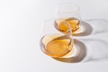 Brandy glasses. Strong spirits in glasses, drinks at the bar