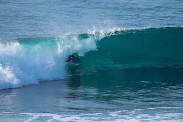 Fototapeta premium Surfer in a perfect barrel wave