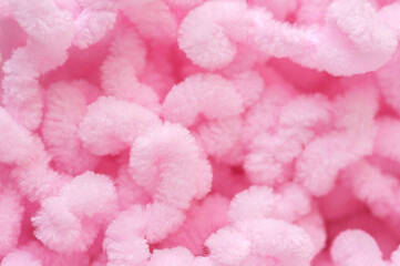 Abstract background of pink threads for knitting