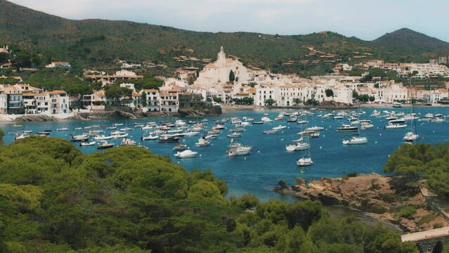 Boats anchored in coastal town of Cadaques. Small village on the Mediterranean. 