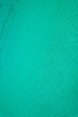 Background, texture of relaxing, calm turquoise, transparent sea water with stones. Summer vacation. Blue ocean lagoon. Drone, copter top view.