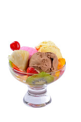 Ice cream with berries in glass bowl on white background. Dessert.