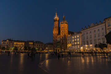 Fototapeta na wymiar Night photos of the market square in the old town with St. Mary's Basilica.Krakow, old town.Poland.