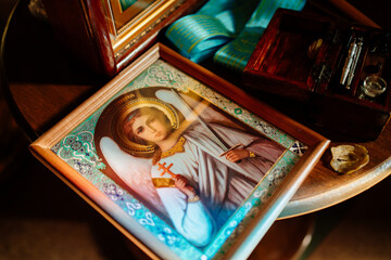icon on the table next to the baptismal set in the Orthodox Church.