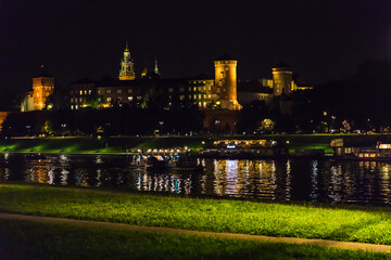 Fototapeta na wymiar Night view of the Wawel Hill, the Royal Castle and the Wawel Cathedral.