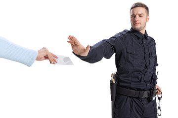 Portrait of young man, policeman wearing black uniform refuses a bribe isolated on white...