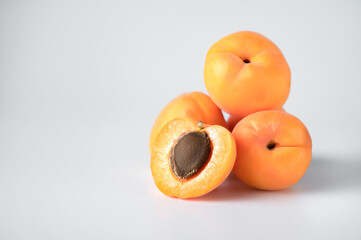 Fresh apricot fruits. Apricot on a white background. Apricot pruning outline.