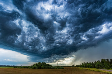 Obraz na płótnie Canvas Dark thunder storm clouds, summer, climate change concept