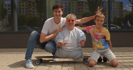 A happy disabled person with dancing friends. Outdoor portrait. Good mental health is characterized...