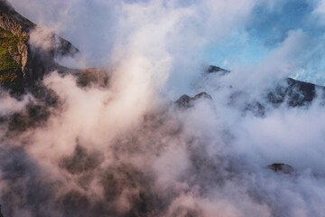 clouds over the mountains from madeira pico do arieiro portugal 