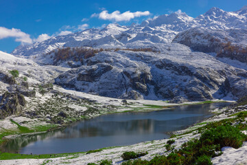 Naklejka na ściany i meble Lakes of Covadonga in Asturias with snowy mountains